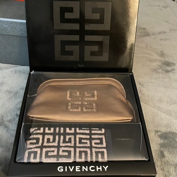 Givenchy cosmetics pouche and a wash towels comes in a set as a gift. Preloved - Picture 1 of 10